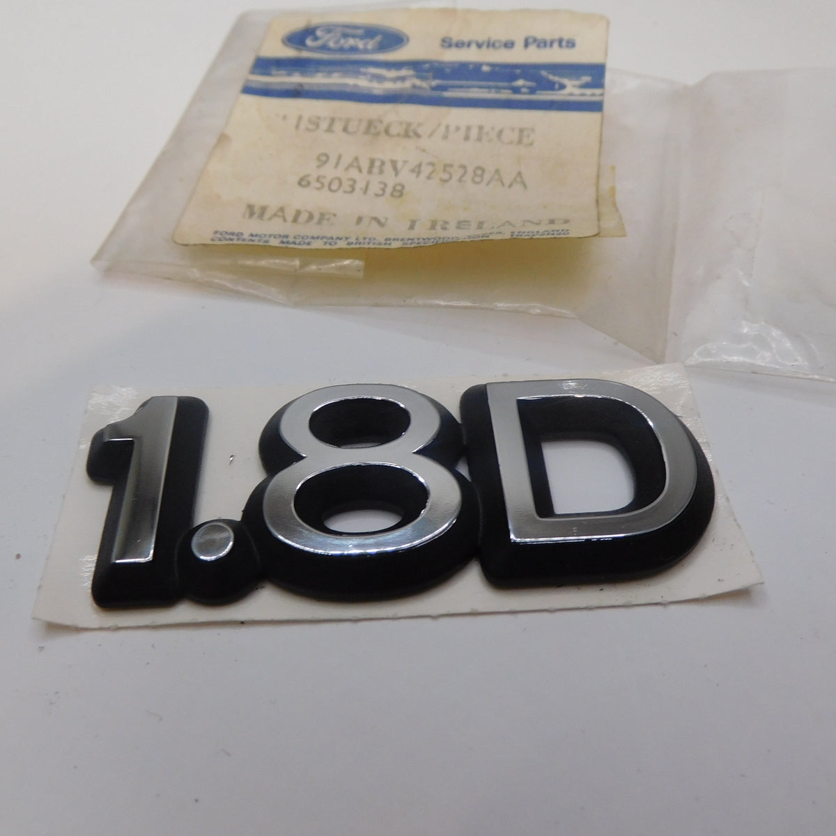 Emblem Abzeichen Heck 1.8D 6503138 Ford Escort 1990-1992 Orion 1990-1993